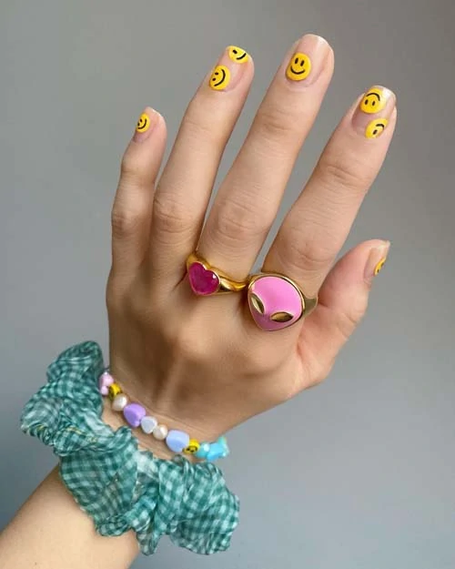 Smiley emoji nails